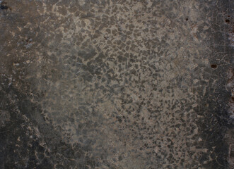 Cracked Dark Surface. Close-up of a dark cracked surface with fine web-like lines, evoking an aged or weathered appearance.