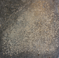 Cracked Dark Surface. Close-up of a dark cracked surface with fine web-like lines, evoking an aged or weathered appearance.