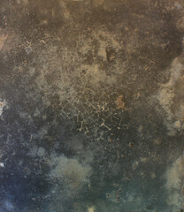 Cracked Dark Surface. Close-up of a dark cracked surface with fine web-like lines, evoking an aged or weathered appearance.