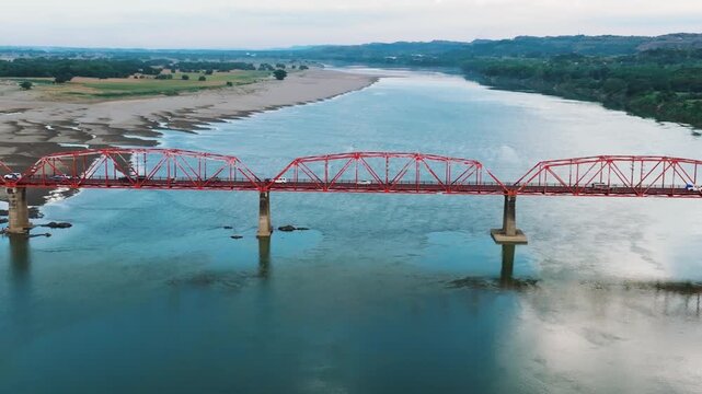 4K Aerial View Of Cagayan River Crossing, Buntun Bridge Connecting Tuguegarao City and Solana
a unique aerial perspective of the bridge as it spans the historic Cagayan River.