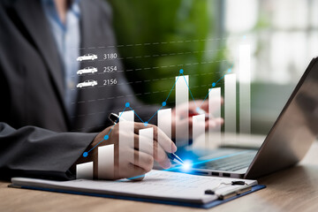 Car Sales and Auto Finance Concept, Businessman showing graph of car sales, Growth of the car sales business, Managing sales growth, Automotive Dealership Transaction, Financial Planning,Compare sales