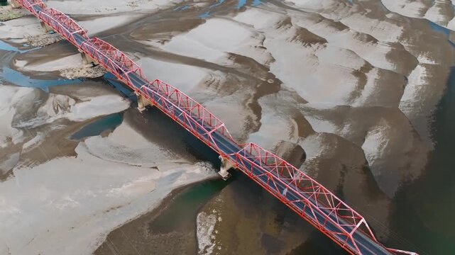 4K Aerial View Of Cagayan River Crossing, Buntun Bridge Connecting Tuguegarao City and Solana
a unique aerial perspective of the bridge as it spans the historic Cagayan River.