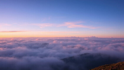 Fototapeta premium Sky's Embrace: A mesmerizing aerial view showcases the serene majesty of a vibrant sunrise painted across a sea of soft clouds, a perfect metaphor for peace and serenity.