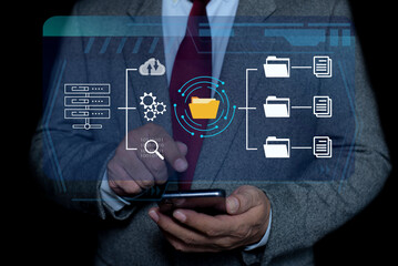 Businessman using visual screen for Documents management information system. documentation in enterprise with ERP. online documentation database and process automation to efficiently manage files © bigjom