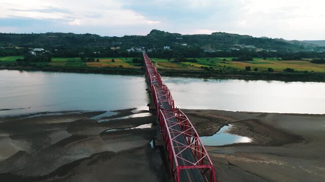 4K Aerial View Of Cagayan River Crossing, Buntun Bridge Connecting Tuguegarao City and Solana
a unique aerial perspective of the bridge as it spans the historic Cagayan River.