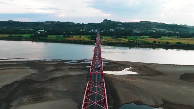 4K Aerial View Of Cagayan River Crossing, Buntun Bridge Connecting Tuguegarao City and Solana
a unique aerial perspective of the bridge as it spans the historic Cagayan River.