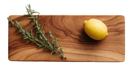 Wooden cutting board with lemon and herbs