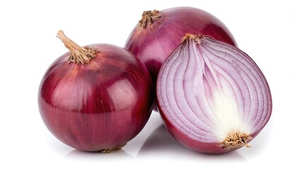 Fototapeta premium Purple onion layers on gray countertop. Onion stem points up, leaves down. Outer layer dark purple, inner layer vibrant purple. Whole onion sliced into three parts