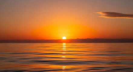 Naklejka premium Golden Sunset Over Calm Ocean Water
