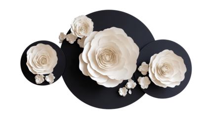 Layered cream roses on dark discs