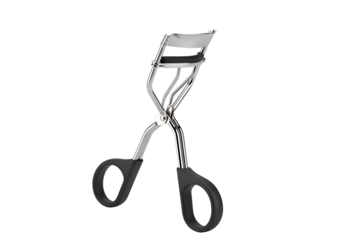 Close-up of a metal eyelash curler.