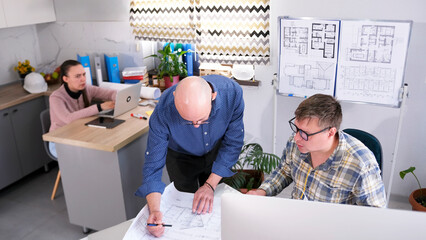 The head of the architectural department gives an order to his subordinate. The engineer discusses...