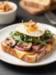 Toasted sourdough topped with arugula, sliced beef, cheddar, sautéed mushrooms & onions, and a sunny-side-up egg. Finished with crispy shallots