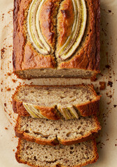 A close-up of freshly baked banana bread, beautifully sliced and ready to enjoy.