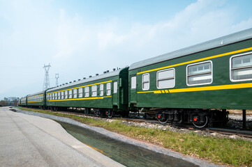 Fototapeta premium Green coaches, The vintage Chinese train