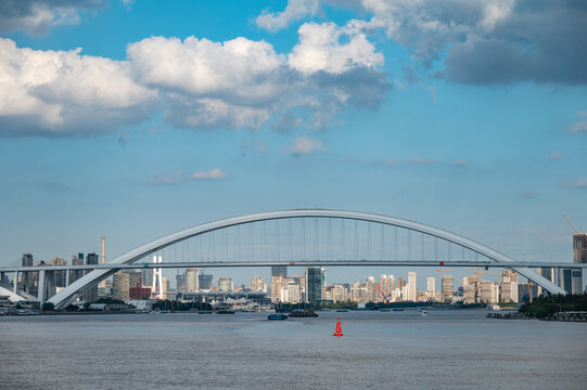 A modern arch bridge across the Huangpu River, the Shanghai Lupu Bridge