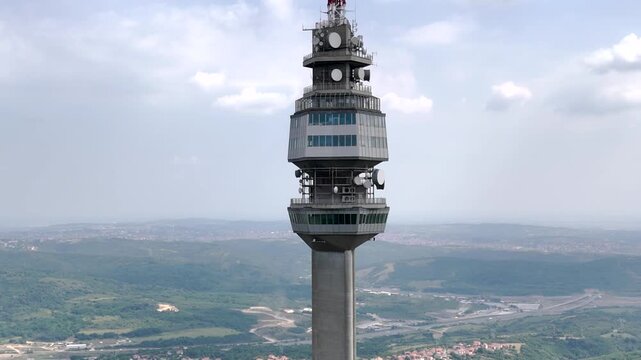 Drone pull-out from Avala Tower revealing full structure and surroundings