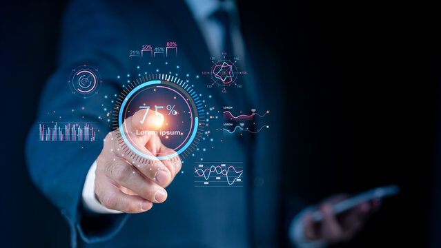 Businessman touching virtual HUD screen with futuristic data visualization, analytics dashboard, progress indicator, and digital graphs, representing modern technology and digital transformation