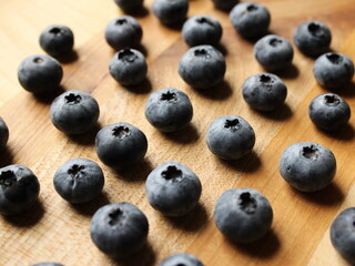 blueberries on wooden background