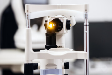 Interior of a modern ophthalmology clinic with modern equipment. The concept of new ophthalmological and modern technologies, diagnostics and vision treatment. 
