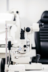 Interior of a modern ophthalmology clinic with modern equipment. The concept of new ophthalmological and modern technologies, diagnostics and vision treatment. 