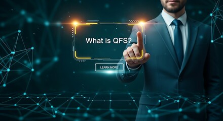 QFS education concept. A professional points to a simple holographic interface asking "What is QFS?" with a "Learn More" button.