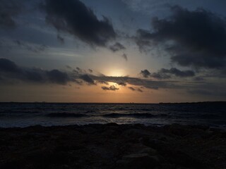 sunset over the sea in Paros, Greece