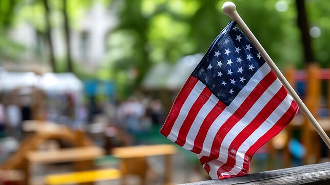 Children playing joyfully in park with american flag waving captivating scene of fun and freedom - Powered by Adobe