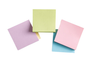 Four pastel-colored sticky notes arranged in a loose stack