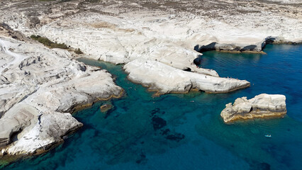 Aerial view of Sarakiniko beach, Milos Island, Greece. White volcanic rocks and turquoise sea