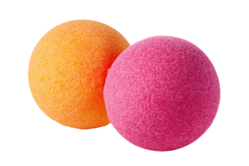Two brightly colored, fuzzy balls, close-up.  Orange and pink spheres.  Soft texture