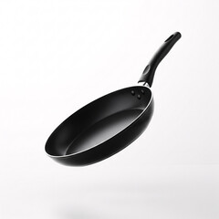A black frying pan, suspended in mid-air, creating a dynamic effect,