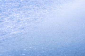 Natural texture of ice, frozen lake  as  background.