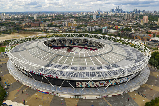 Aerial image of London Stadium (West Ham Stadium) with city of London Skyline on the Horizon. 