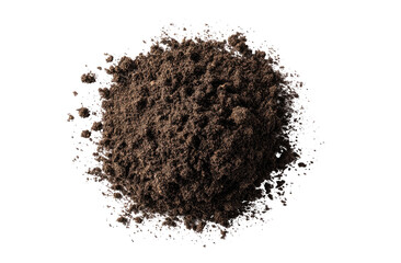 A close-up, top-down view of a clump of dark brown soil, appearing as a sphere, with a slightly rough texture. Tiny particles radiate outwards from the center