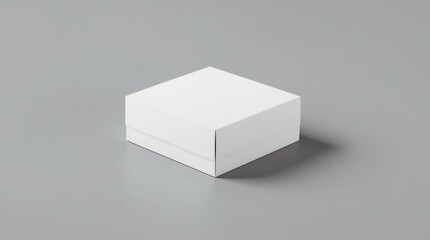 Blank white wide flat box with closed hinged flap lid on dark wooden background. Clipping path around box mock up. 3d illustration