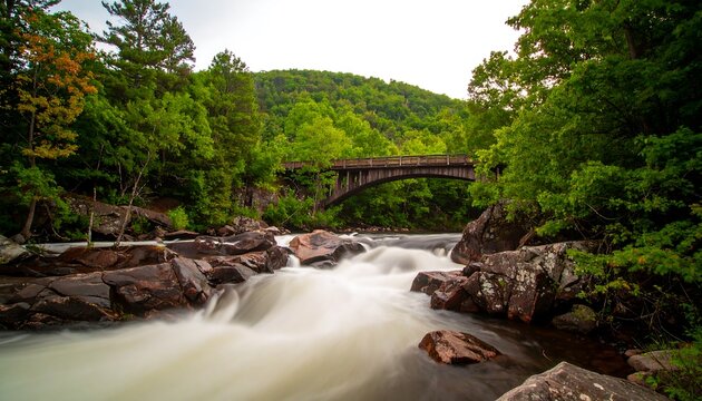 River rushing under an old bridge