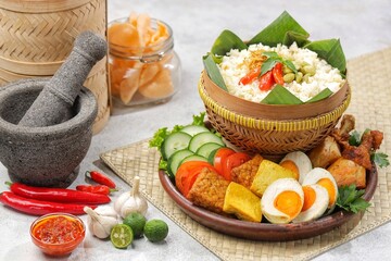 Nasi Liwet Sunda from West Java with its unique Sundanese cuisine a different taste and presentation from Sundanese eating tradition called ngeliwet or botram