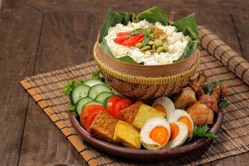 Nasi Liwet Sunda. Sundanese liwet rice is a rice dish cooked in a special way using various spices and herbs.