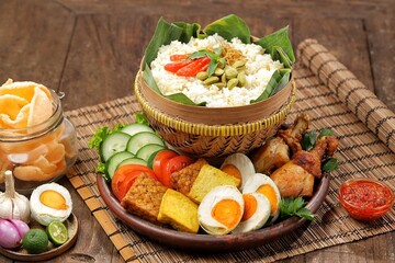 Nasi Liwet Sunda from West Java with its unique Sundanese cuisine a different taste and presentation from Sundanese eating tradition called ngeliwet or botram