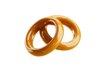 Two interlocking, glossy, caramel-colored rings