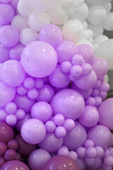 Lots of purple balloons with air for birthday.