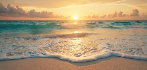 Obraz premium Golden hour sunset over tranquil sea with gentle waves lapping on sandy beach. Colorful sky reflects on calm ocean surface creating peaceful, relaxing summer atmosphere perfect for travel, vacation