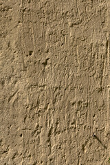 Scratchy stucco wall surface creates textured background plate