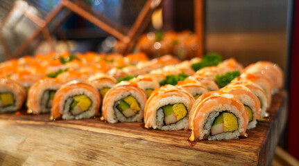 Delicious gourmet Japanese sushi rolls with fresh salmon and rice served on a plate for a healthy meal