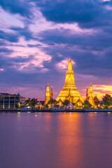 Twilight view of Wat Arun Ratchawararam Ratchawaramahawihan at sunset in bangkok Thailand. Landmark of Along the Chao Phraya River Thailand