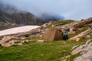 Fototapeta premium Mother and son camping in nature