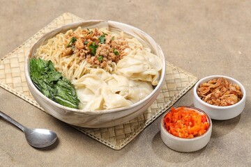 Mie Ayam Pangsit. Wonton Chicken Noodles are a type of wet noodle also known as 