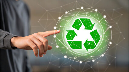 Person s hand touching a glowing green recycling symbol surrounded by a digital network of interconnected nodes and lines