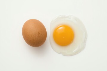 Perfectly cooked sunny-side-up fried egg isolated on white.